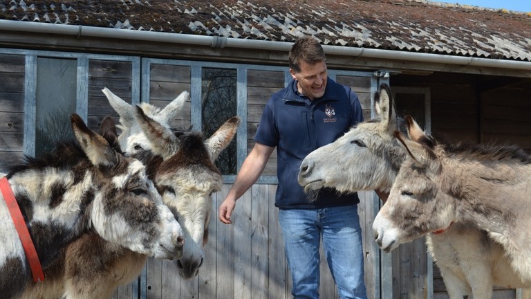 Ben Hart, Senior Lead in Behaviour and Human Behaviour, with Blackpool donkeys.