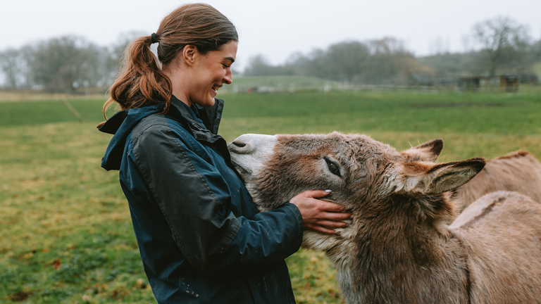 Rescue donkey with donkey welfare advisor Hannie.