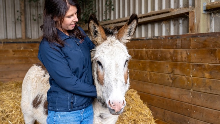 Spotty with his groom.