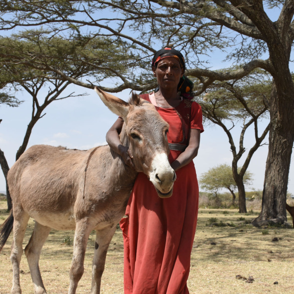 Samuna stood with donkey