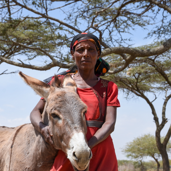 Women with her donkey in Ethiopia