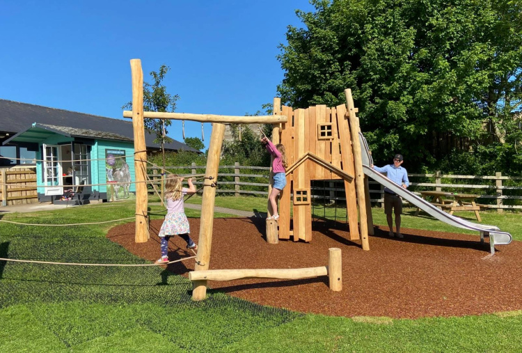 Children exploring the new play park