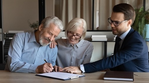 Couple making a will with solicitor