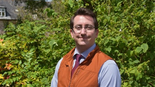 Trustee Andrew Stringer