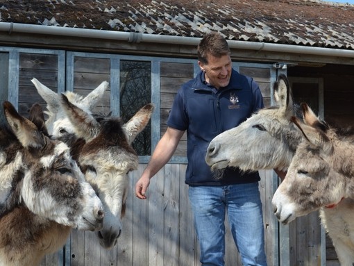 Ben Hart, Senior Lead in Behaviour and Human Behaviour, with Blackpool donkeys.