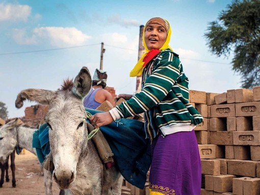 Brick kiln worker and donkey.