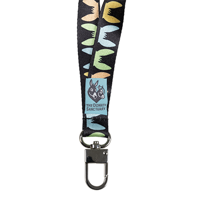 Lanyard for keys and ID's featuring colourful donkey ears on a black background.