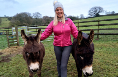 Karen Lawson with Barney and Pumpkin, the donkeys