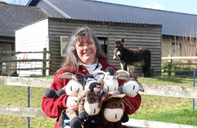 Judith Crockford with lots of Neddies and a donkey in the background